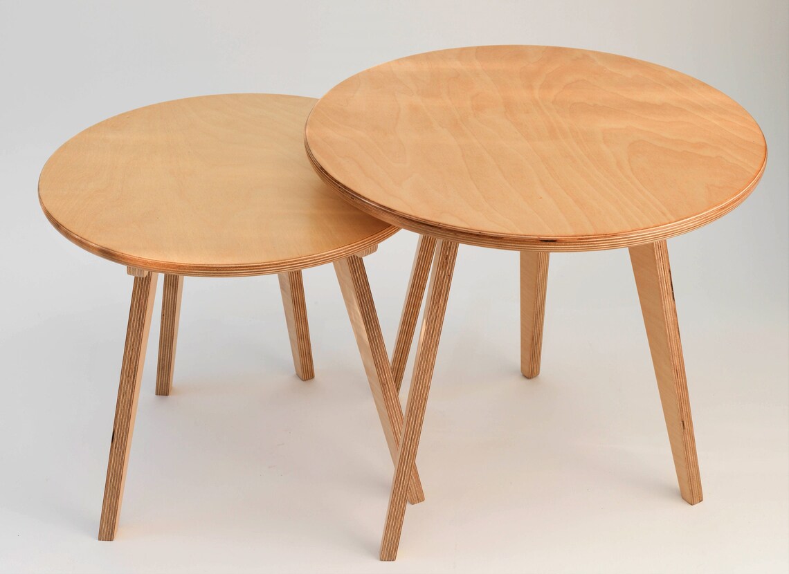 Set of natural birch wood nesting tables with a modern design