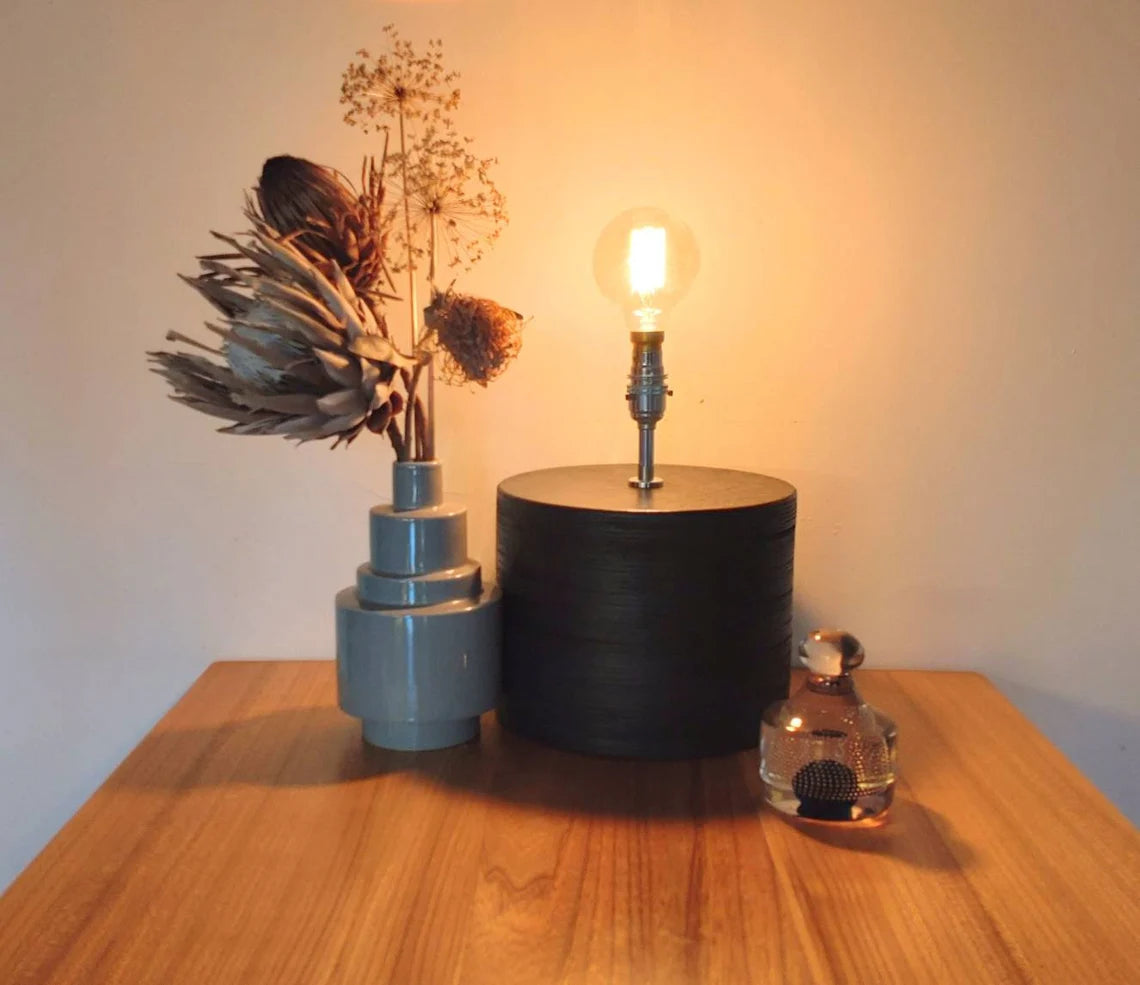 Black table lamp for ambient lounge and living room lighting.