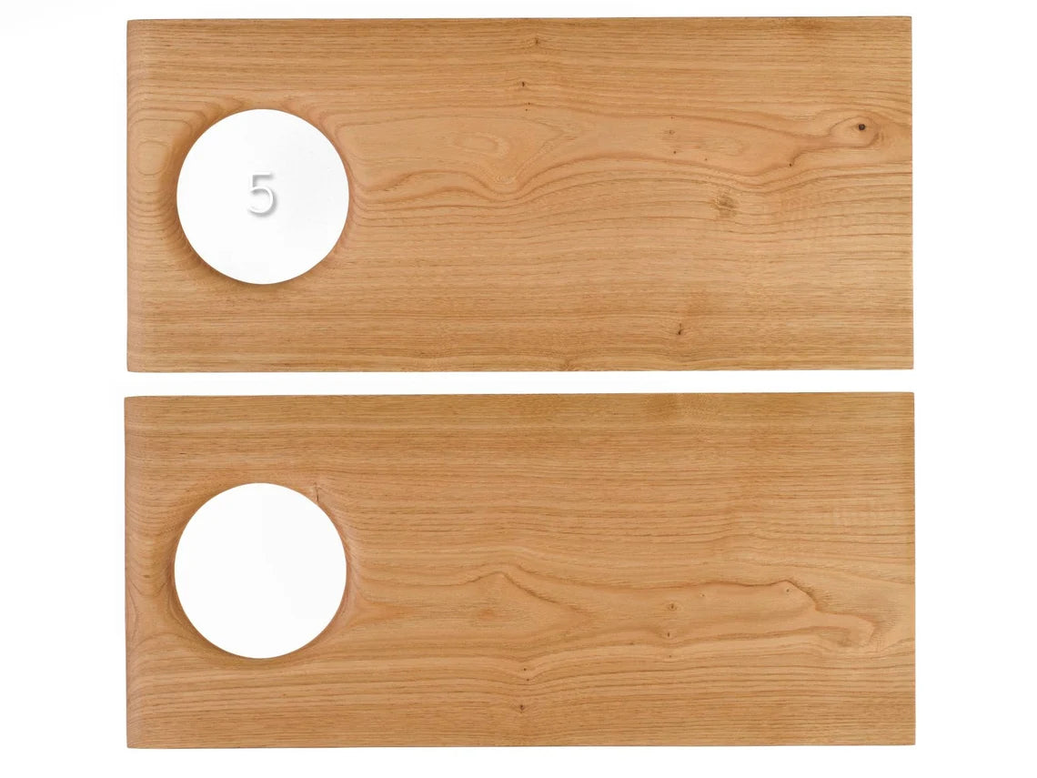 Designer wooden cutting board with a modern, minimalist aesthetic.