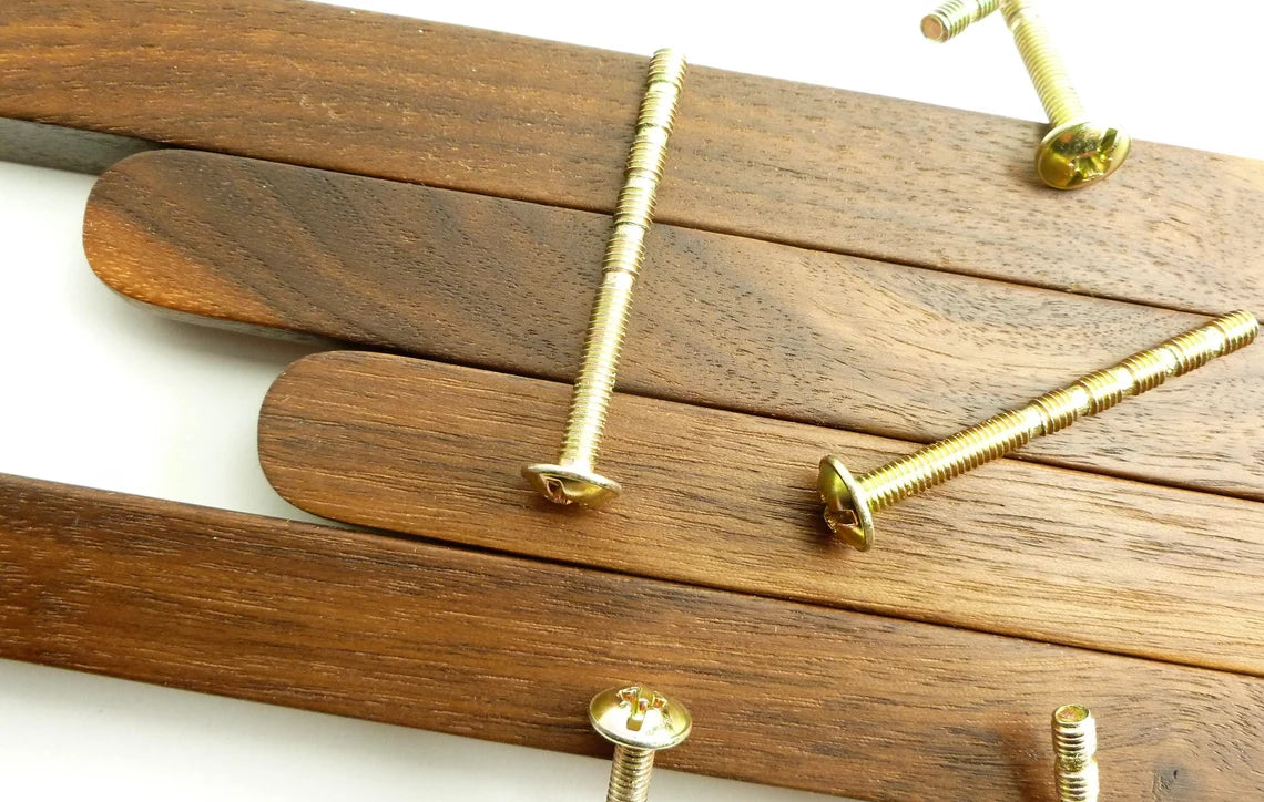 Easy-to-install wardrobe handles in American Walnut wood.