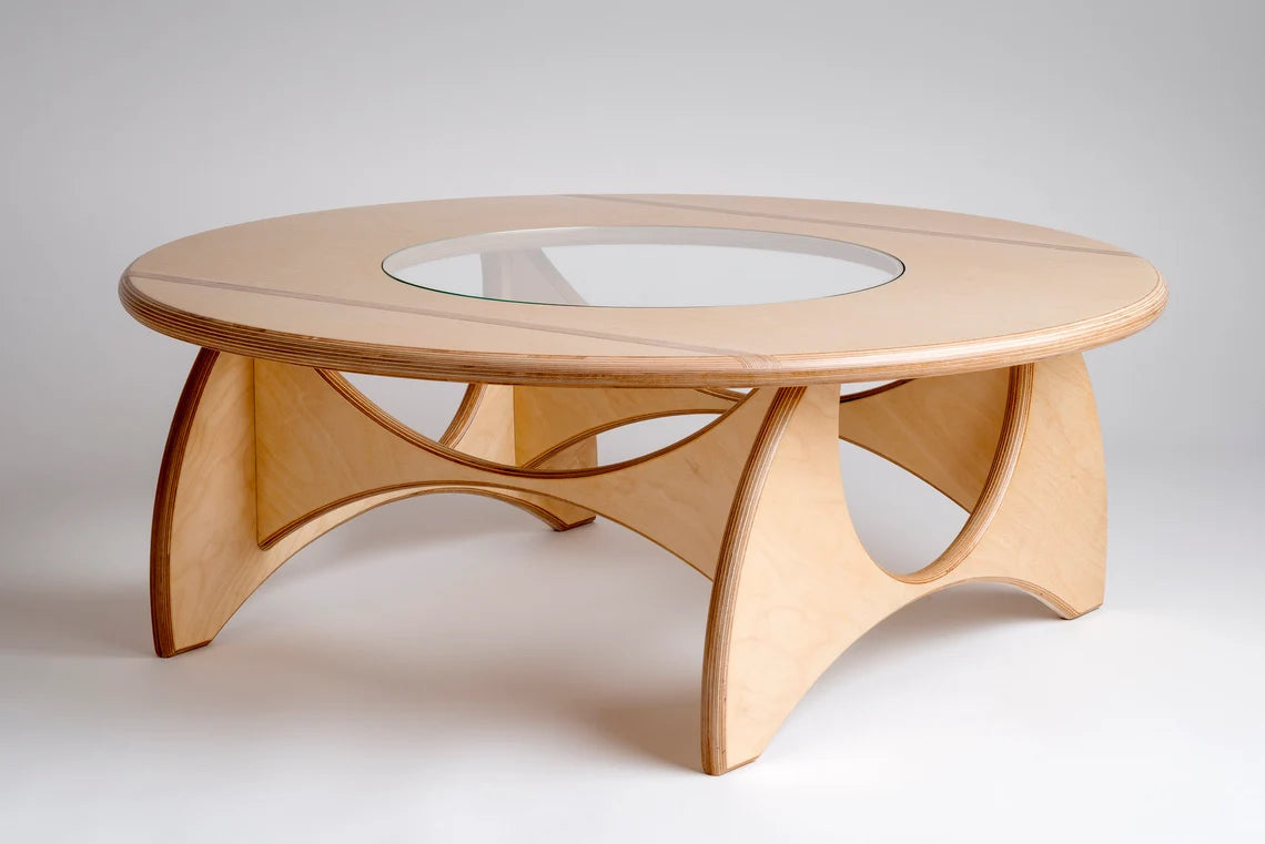 Stylish birch plywood coffee table with a durable glass centerpiece.