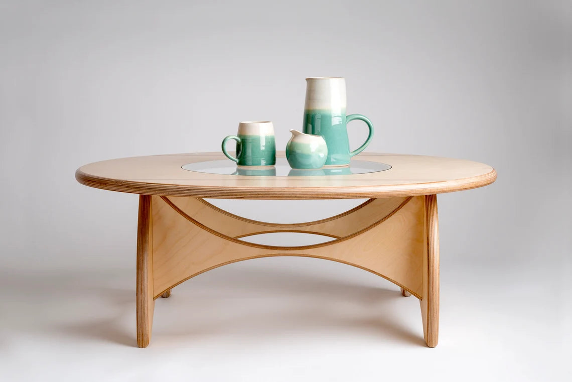 Elegant round coffee table with a 6mm toughened safety glass insert.